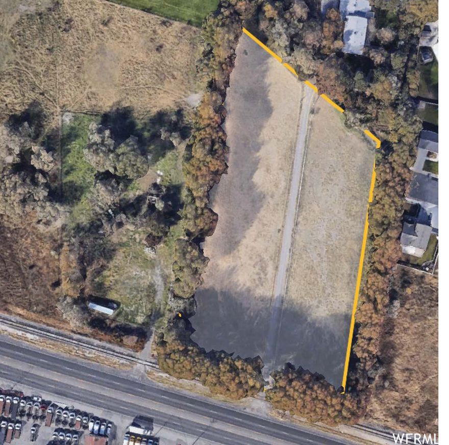 Fantastic Find! This property is raw land, perfect for development. This is known in the Pleasant Grove Planning as, the West State Street District. Are/Features: The western end of State Street (Highway 89) Commercial corridor from Pleasant Grove Boulevard to 2000 West Street. The cities objectives are:  * Provide an area for the Commercial and Service needs of the community * Require high-quality architecture and site design  * Preserve the street's function as a major traffic carrier, with uses suited to a high-volume roadway.  The city will allow small retail with a row of single-family on the north side of the property. Single-family parcels will need to be 7,500 sqft.