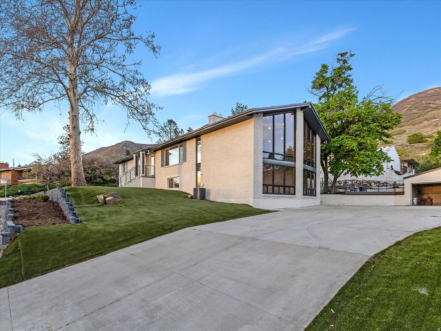 Fantastic Home. Completely Updated, with New Kitchens, Bathrooms, Flooring, Paint, Doors and More! Excellent location on the east bench of Centerville, easy access to the freeway with a quick commute to both Salt Lake City and Ogden. Located on a quiet street with great views. This home has an attached two car garage and a separate smaller garage for all your lawncare supplies. Plenty of parking with two separate driveways. A versatile floor plan allows for the home to be used as one large home or as two separate units. With an ensuite, laundry and kitchen on each level you have flexibility. *Office could be used as a third bedroom upstairs or as a formal dining room.  Go take a look, you'll love this home!