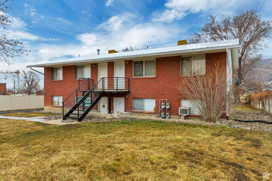 Well-maintained fourplex in a quiet and desirable part of town! Fully rented with great tenants, making it a solid investment opportunity. One unit has been updated (see photos), while the other three units are in similar condition to the second unit shown. The owner has never had trouble keeping the property rented. Don't miss out on this turnkey investment!