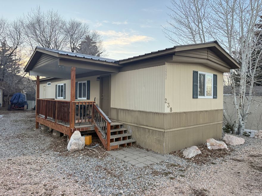 Amazing lot just feet away from Bear Lake views! Boasting NEW carpet, NEW Quartz counters! and NEW Metal roof! 2 bedrooms with Bunk beds and furniture included! Great vacation home to enjoy the all season recreation in this area!  ATV side by side available with the sale!!!