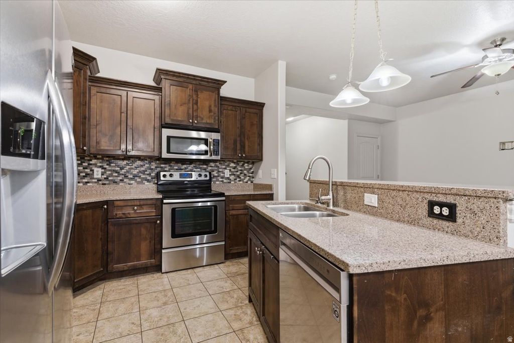 Photo of 4444 S CROSS CREEK RD W #19B, West Haven, UT 84401 (MLS # 2153041)