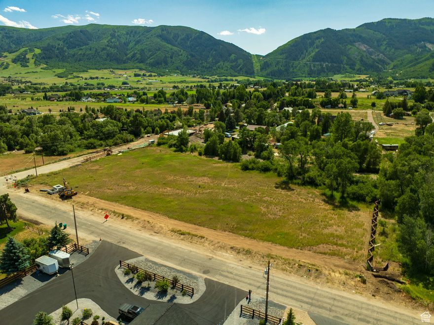 ***PRICE IMPROVEMENT*** Rare Flat Lot in Eden with Private Well and water rights.   Discover an extraordinary opportunity to build your dream home on one of Eden's most desirable 3 acre parcels. This rare flat lot offers an ideal building envelope that minimizes the need for costly excavation or retaining walls-saving you time and money during construction.  Nestled in the heart of Ogden Valley, the property features a private well and highly sought-after water rights-an increasingly rare asset in this region. A serene river meanders through the land, enhancing the natural beauty and providing a tranquil setting for your future home. Mature trees line the property, offering privacy, shade, and a picturesque backdrop in every season.  With no HOA restrictions, this lot provides freedom and flexibility for your vision-whether it's a private retreat, equestrian property, or custom estate. Located just minutes from ski resorts, Pineview Reservoir, and charming downtown Eden, this property blends convenience with rural luxury.  Don't miss the chance to own a flat, build-ready lot with unmatched natural features and essential infrastructure already in place.