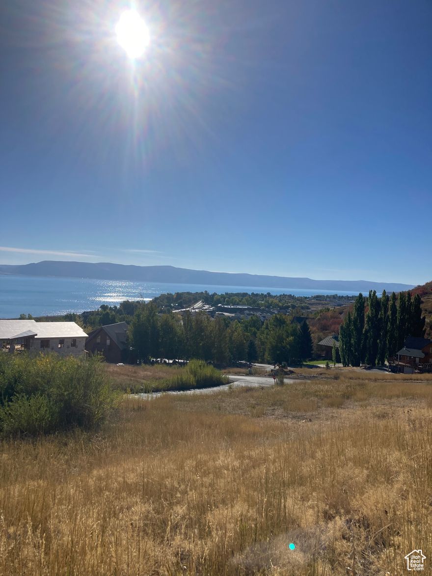 Fantastic Lot in Harbor Village Sub. Short term Rentals are allowed. Pool, Tennis, Basketball, and play area are part of the HOA. Just above the marina for great lake views and easy access. Paved roads and year around access. close to bike trails, as well as snowmobile trails. Easy building lot for your dream home or Investment property. Adjacent lot available as well for more room or garage. great neighborhood with many new homes. Come start making family memories that will last a lifetime.