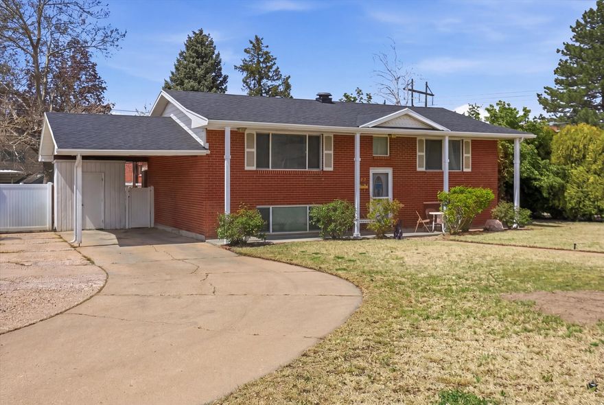 Opportunity is knocking on your door. This solid brick home with 4 bedrooms and 2 bathrooms offers incredible potential and is a great opportunity for investors or homeowners alike. The basement has separate access and features 2 bedrooms, a family room, a three quarter bathroom, and a laundry area. There is space to add a small kitchenette, making it ideal for a potential income producing setup. Pride of ownership shows with over 16 years of care. Recent updates include a newer roof, updated HVAC system, brand new water heater, new front porch pillars, new front gutters, an 8 foot vinyl fence, a 12 by 25 RV pad, and a freshly painted deck. With a little TLC, this home can truly shine as either an income producing property or a comfortable primary residence. Call today to schedule your private tour.