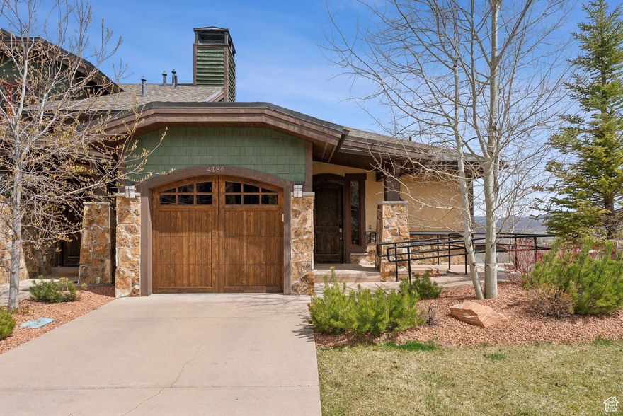 Welcome to 4186 Fairway Lane, a beautifully furnished townhome tucked just off the main Canyons corridor. Located directly on the Canyons Golf Course and just steps from the Frostwood Gondola, this home offers the ideal balance of peace, privacy, and proximity to world-class skiing, shopping, dining, and spa services. Completed in 2019, this 3-bedroom, 2.5-bath residence features a thoughtful layout with a private garage, heated driveway, and the distinction of being the only unit in the community with its own in-home elevator. Inside, clean lines, natural textures, and warm finishes create an inviting mountain ambiance. The spacious main level is designed for gathering, with a comfortable living area, elegant dining space, and a gourmet kitchen perfect for entertaining. Two king bedrooms and a bunk room provide flexible sleeping arrangements for family and guests. Outside, a private balcony offers the perfect spot for summer BBQs, while the lower-level patio features a relaxing hot tub with views of the surrounding landscape. Whether you're looking for a full-time home or a mountain getaway that's ready to enjoy, this turnkey property delivers comfort, convenience, and timeless style in a location that truly offers the best of Park City living.
