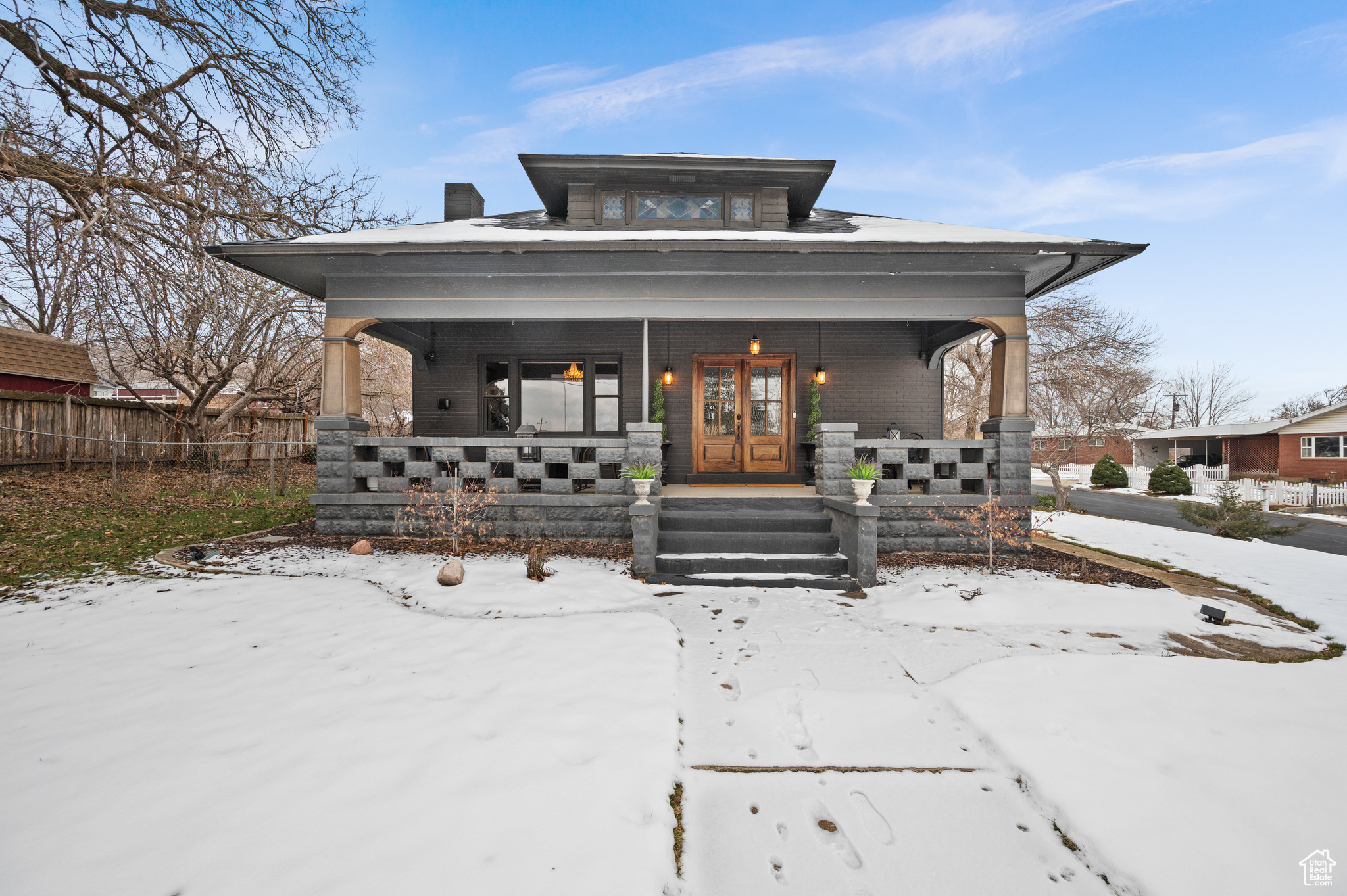 Charming Historic Home with Bonus Carriage House and Prime Location. This beautifully remodeled 4-bedroom, 3-bath historic home offers 2,445 sq. ft. of modern elegance while retaining its timeless charm. Located just minutes from downtown, the University of Utah, and freeway access, it combines convenience with character. Newer roof, New furnace, tankless water heater and a brand new sewer line are just a few of the upgrades. Please see the attached upgrades list for all the details.  Adding even more value is a brand-new 600 sq. ft. carriage house. With 14-foot vaulted ceilings, a European spa-inspired bath, and a fully equipped modern kitchen, this space is as functional as it is stunning. Generating an average of $4,000 in monthly rental income, it's perfect for guests, tenants, or extended family.  All furniture and hot tub are negotiable.