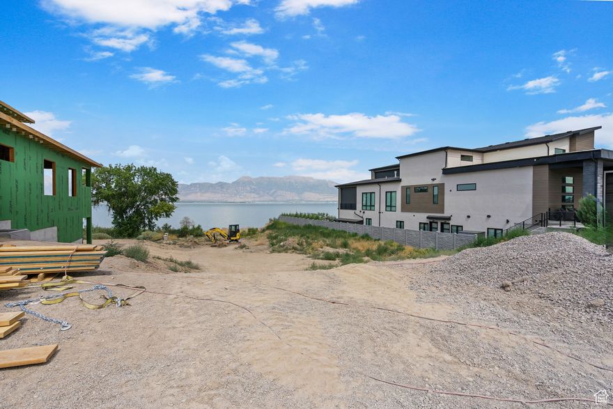 "Build your dream home on Utah Lake." Unobstructed views next to multi-Million dollar homes makes this lot the perfect lot to build or land bank. Seller is building the home next door and willing to help if you are looking for a builder. Reach out for a private showing.