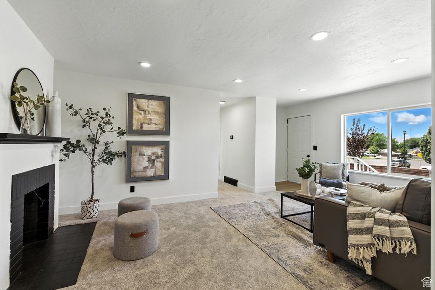 Fully renovated and move-in ready, this 5-bedroom, 2-bath Spanish Fork home combines modern updates with a prime location.  Upgrades include new LVP flooring, plush carpet, fresh paint, updated fixtures, and a second bathroom for added convenience. Large windows and sliding glass doors fill the home with natural light, while the open kitchen, dining, and living areas create a perfect space for gatherings. Situated on a desirable corner lot just minutes from Main Street, schools, parks, and dining.