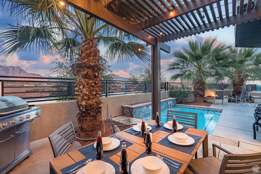 One of the highest grossing 5 bed vacation rental in all of Santa Clara and especially Ocotillo Springs. Very well Located close to trails, Harmons, Gubler Park & just 10 minutes from down town St. George, Snow Canyon State Park and Tuacahn Amphitheater! Fully furnished 5-bedroom, 6-bathroom nightly rental designed for relaxation and luxury. Unique floor plan with beautiful decor & furniture designed by 1of the best vacation rental designers in Utah. Enjoy the serenity in the back yard with 3 Palm trees, firepit and a private pool & separate spa. Enjoy the Big deck upstairs with breathtaking views of the Red Mountains by day & the stars at night w/another firepit. End unit & convenient access in & out as well as close proximity to all the community amenities. Ocotillo includes: a beautiful resort pool w/ cascading waterfalls & slide, a custom splash pad, huge hot tub, fantastic clubhouse w/full kitchen, full gym, game rm w/pool & ping pong, 2 bathrooms, dining and gathering areas to enjoy the fire pit & BBQ area & 2 pickleball courts with plenty of extra parking.