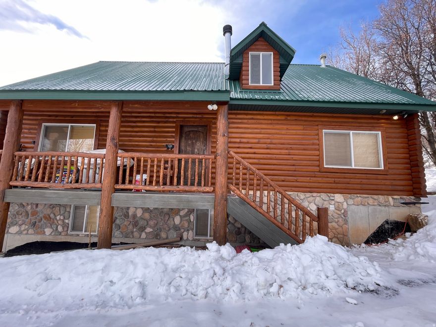 Back on the market just in time to plan all the summer fun at this beautiful log cabin in Fish Haven, Idaho! This very well maintained cabin comes fully furnished with 5 bedrooms, 3 bathrooms on the west side of Bear Lake. You can enjoy the outdoors any season at this beautiful property that overlooks Bear Lake with hiking trails, snowmobile trails, boating or swimming on the lake,  This cabin features an open floor concept with 3 different family rooms, a fireplace to gather in the cool evenings, a stylish full kitchen, and a full size bathroom on every floor!  NO overnight rentals!  HOA amenities include use of pool, tennis court, and private beach access.
