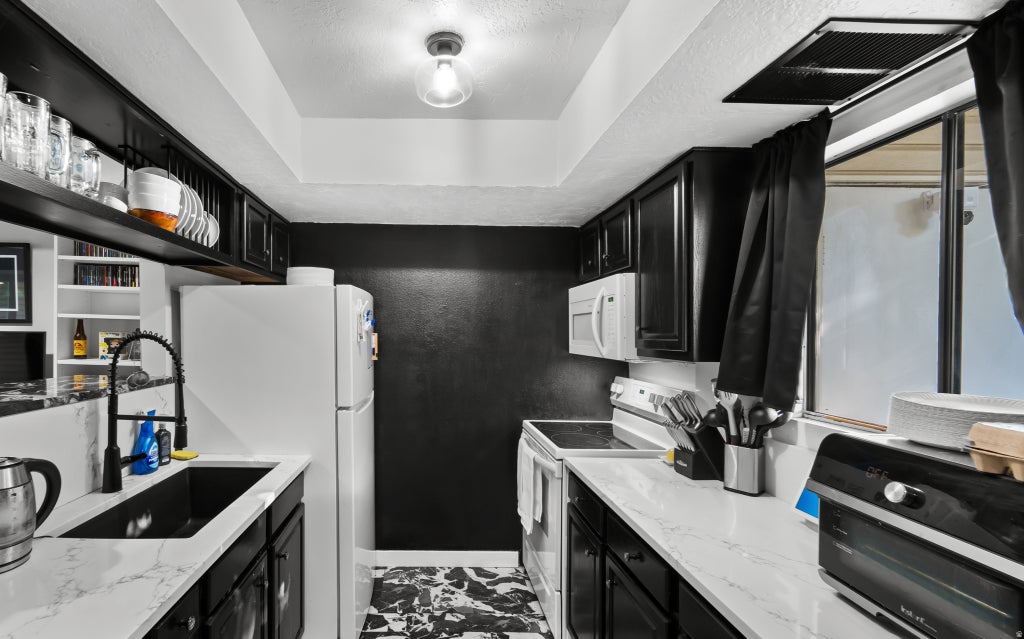 Photo of 5308 S BEN DAVIS PARK, Salt Lake City, UT 84123 (MLS # 2186765)