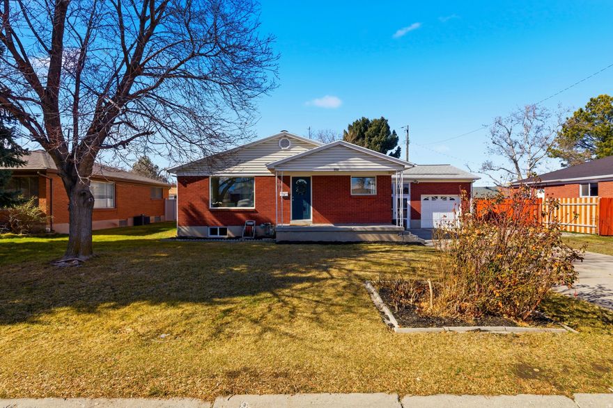 Welcome home!  This beautifully remodeled rambler has two bedrooms and two bathrooms on the main level with an additional 2 bedrooms, one bathroom, a kitchenette and second laundry on the basement level. It is filled with natural light and boasts stunning new flooring, paint, countertops and cabinetry throughout the entire home. With a newer roof and updates top to bottom, this home is move-in ready with the option of offsetting your mortgage with a basement rental if you don't need all of the space yourself.  The connected breezeway from the attached garage makes walking into the home easy without worrying about weather.  Have an RV or need extra parking?  No worries!  This extra long driveway allows for multiple cars and there is room for an RV on the side of the one-car garage if you need it! OPEN HOUSE Saturday 2/28 10am-1pm and Sunday 3/1 1:30-3:30pm