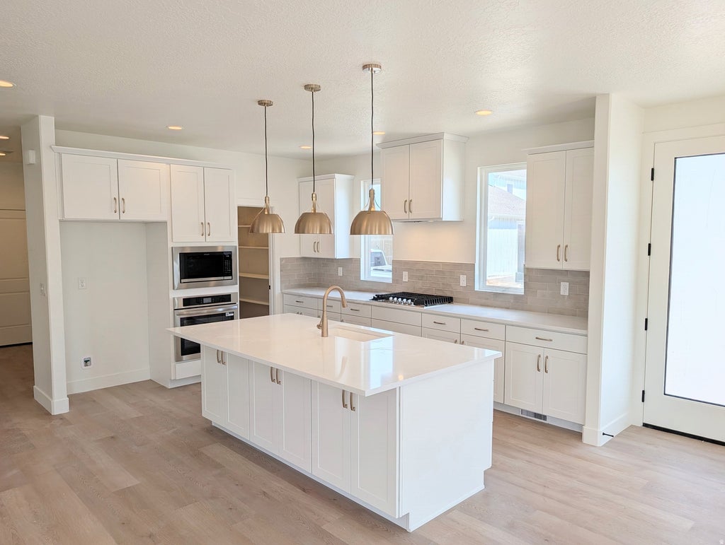 Photo of 7028 W LAKE AVE S #121, South Jordan, UT 84009 (MLS # 2177426)