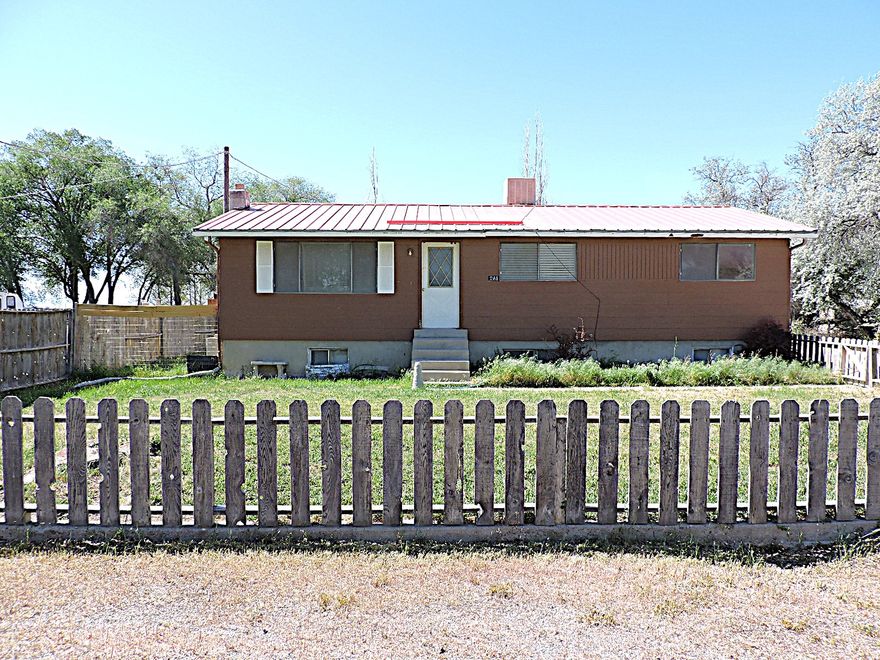 This spacious home offers plenty of room, featuring both a comfortable living room and a large family room with a pellet stove that provides an excellent alternative heat source. The home includes a total of 4 bedrooms and 2 full bathrooms, with a generously sized primary bedroom. Situated on 0.51 acres in a small community, the property allows for large animals and offers space for all your toys. Ready for its new owner, this property combines comfort, functionality.