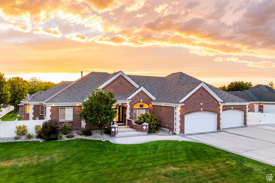 Exceptional Custom-built Estate home showcasing timeless red brick architecture on a stunning one-acre parklike setting. This meticulously maintained residence, lovingly cared for by its original owners, offers the ultimate in luxury living and entertainment. Thoughtfully curated with uncompromising attention to quality and craftsmanship. Soaring 10-foot ceilings throughout the main floor and basement create an impressive sense of space and grandeur. The heart of the home features a deluxe chef's kitchen perfect for culinary enthusiasts and hosting gatherings. Resort-style amenities include a pristine saltwater pool for relaxation and recreation. Car enthusiasts and collectors will appreciate the impressive 14-car garage capacity with an 8-car attached garage and 6-car heated detached garage, providing abundant space for vehicles, toys, and storage. The heated detached garage features a fully furnished 2-bedroom, 2-bathroom ADU above, perfect for guests, rental income, or multi-generational living. Peace of mind comes standard with a whole-home Generac generator ensuring uninterrupted power.   Prime Riverton location in the heart of the Salt Lake Valley offers the perfect balance of tranquil living and convenience - just minutes from Riverbend Golf Course, I-15 access, and downtown Riverton shopping, while being ideally positioned 30 minutes from both Salt Lake City and Provo, and 30 minutes from Utah's famous world-class skiing. The expansive grounds offer endless possibilities for outdoor enjoyment and privacy.    This property cannot be rebuilt for this price - with too many exceptional custom features to list here, this is truly a rare opportunity to own a sophisticated custom estate that seamlessly blends classic elegance with modern luxury and unparalleled functionality. You don't want to miss this home!  Call for a private showing. All buyers must provide proof of funds prior to an approved appointment. Listing agent must be present for all showings.