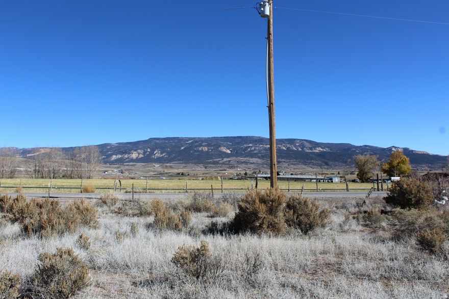 LOA BUILDING LOT. .5/acre on the north edge of Loa in the Sleeping Legends Ranch Subdivision, a thoughtfully designed subdivision with new homes and a well-established neighborhood. Pretty mountain views and convenient location. City water and power stubbed to lot line. Ready to build! Lot 11, Sleeping Legends Ranch Subdivision.