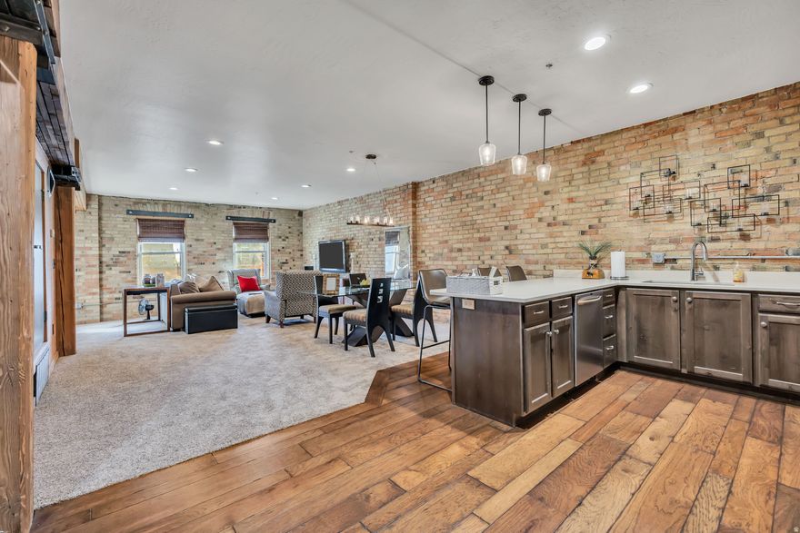 Located in the beautiful, industrial style warehouse building downtown. 1 block from the gateway and Delta Center. Wood beams, brick walls, hardwood floors and an open layout all contribute to this amazing studio in the perfect downtown location. Carpet was just replaced this October. Building is gated and 1 parking spot is reserved and owned for just this unit. NIGHTLY RENTALS ALLOWED. Sold fully furnished and decorated. This unit is well appointed ready to go! Unit is active as a nightly rental so please text or call agent to schedule showings. Thank you.