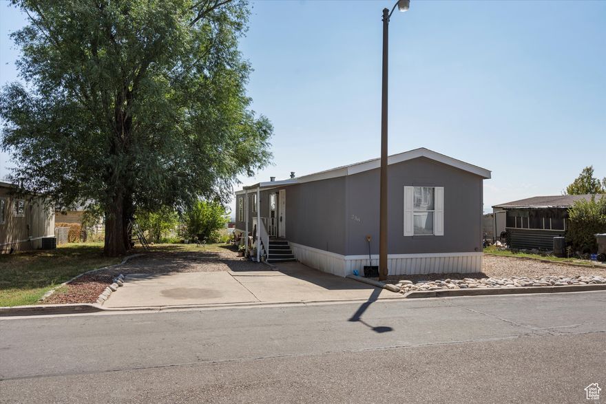Welcome to 2500 N Fort Lane #238 in Layton! This well-maintained single-wide home, built in 2006, offers comfort and convenience with 3 bedrooms and 2 bathrooms. The open layout provides a functional flow, making it perfect for everyday living. The kitchen comes fully equipped with all appliances included, featuring a gas range for the home chef. With a dedicated dining area, cozy living space, and private bedrooms, this home is move-in ready. Enjoy the ease of single-level living with low-maintenance design and all the essentials already in place. Located in a well-kept community in Layton, you'll have quick access to shopping, schools, dining, and commuter routes. Don't miss out on this affordable opportunity to own your own home in Davis County! Buyer(s)/Buyers agent to verify all information and fees. Please contact park management to verify all fees and park rules prior to submitting an offer.