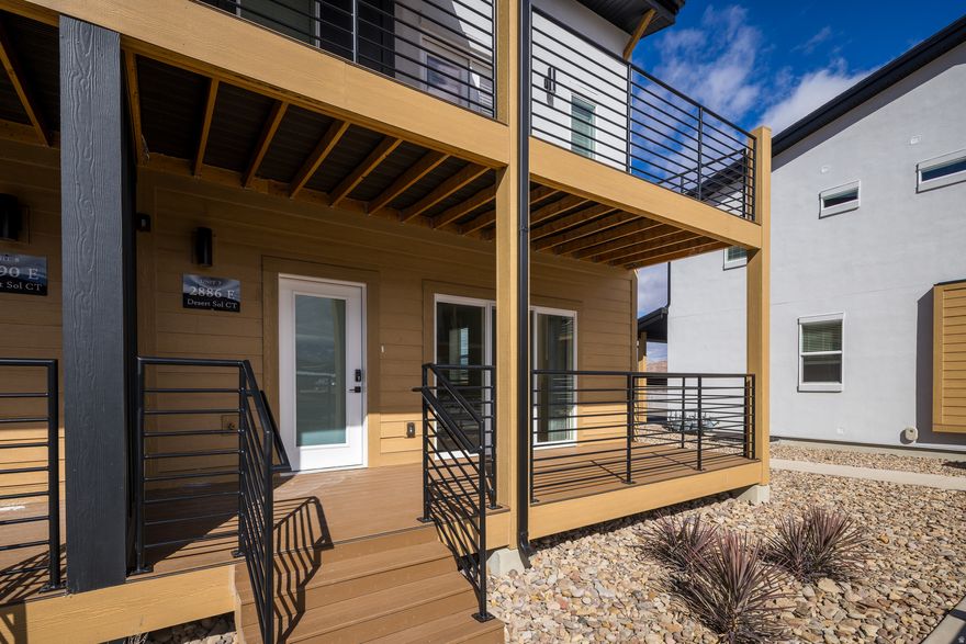 DESERT SOL - Welcome to Desert Sol Villas, an exceptional new luxury townhome community thoughtfully designed in Moab.  This 4 bedroom, 3.5 bathroom residence offers generous living space, modern finishes, and seamless indoor-outdoor flow that complements the surrounding red rock landscape. The open-concept layout features a well-appointed kitchen with quality stainless steel appliances, spacious primary suites, in-unit washer and dryer, and abundant storage to accommodate both everyday living and recreational gear. Expansive windows invite natural light while framing Moab's iconic scenery, creating a warm and inviting atmosphere throughout. Step outside to a private outdoor deck designed for taking in Moab's stunning red rock views and evening sunsets. Whether hosting friends, enjoying morning coffee, or unwinding after a day on the trails, the deck extends the living space and captures the peaceful desert setting. Community amenities include a dedicated dog park, offering space for pets to enjoy the outdoors close to home and ample parking is available for residents and guests. Located in a quieter area of Moab with convenient access to shopping, dining, and recreation, this home offers a balance of privacy and accessibility. Just minutes from Arches National Park and Canyonlands National Park, with easy access to hiking, biking, and the Colorado River, this is a rare opportunity to own new construction in one of Utah's most sought-after destinations. *PHOTOS ARE OF A SIMILAR UNIT*  Square footage figures are provided as a courtesy estimate only and were obtained from images.  Buyer is advised to obtain an independent measurement.