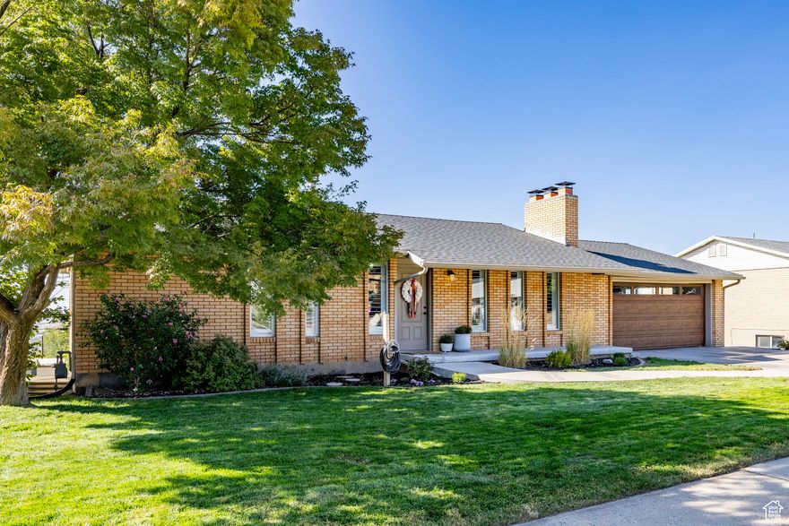 Welcome home to 2024 Bonneview Drive with expansive sunset & mountain views on the Bountiful bench with a mother-in-law apartment. Perched on the peaceful hillside, this home blends timeless design, elevated living with newer finishes throughout and modern flexibility. At the heart of the home, the kitchen features granite countertops, a porcelain farmhouse sink, and a sunny breakfast nook, ideal for everyday moments. Stainless steel appliances are included, and the space opens beautifully into the dining area, which includes a built-in bookshelf for your favorite cookbooks and dcor. A door leads to the back deck, the perfect place to take in evening sunsets and lake views stretching into the distance. The living room offers stunning mountain views and is centered around a striking floating fireplace, creating a warm and inviting gathering space. Just off the garage, a bonus room provides flexibility, whether you need a home office, extra storage, or a functional mudroom. The daylight basement features a separate-entry mother-in-law apartment complete with two bedrooms, a bathroom, and a charming kitchen which is ideal for multi-generational living or rental potential. Whether you're hosting extended family or seeking additional income, this home offers incredible versatility. Out back, you can access a 255-square-foot space that offers even more possibilities, use it as a workshop or additional storage. This location is near 3 neighborhood schools and Mueller Canyon is a local favorite, being known for all of the hiking trails year round. If you work in downtown Salt Lake the commute is easy with Beck Street and the Salt Lake International Airport is 15 minutes away.