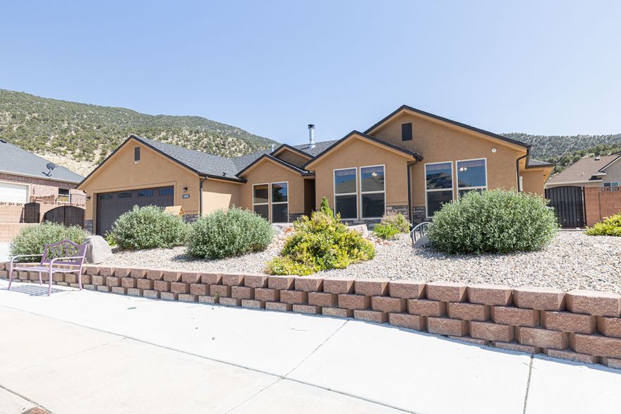 Beautifully upgraded 1,858 sq ft single-level home in Cedar City's desirable Ashdown Forest subdivision. Built in 2018, this home features owned solar, a gated RV pad with 50-amp power, full block walls, raised garden beds, trim lighting, and a covered patio perfect for outdoor living. Interior upgrades include new flooring, remodeled bathrooms and closets, canister lighting, epoxy garage floor, new garage door and opener, pellet stove, smart home system with security, and surround sound wiring. Includes a 10x20 shed with power and workbenches.  Enjoy nearby trails and the best of Southern Utah's outdoors.