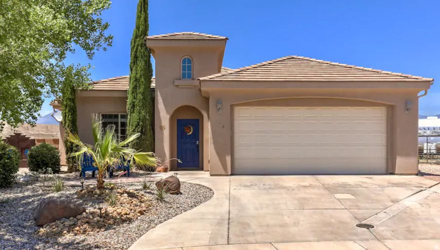 Just 20 minutes from Zion National Park, this beautifully furnished, licensed, and highly successful short-term rental delivers strong income without sacrificing an ounce of comfort - and it shows in the reviews.  Features include an open floor plan, gourmet kitchen, and spa-like primary suite. Sleeps 10! Step outside to your own private retreat - a covered patio leading to a bubbling hot tub perfectly positioned for those legendary southern Utah sunsets.  Additional highlights: solar panels with battery backup, new granite and quartz countertops throughout kitchen, baths, and laundry, a city park right across the street, and no HOA.  This turnkey, fully furnished property is dialed in and ready to go from day one. Whether you're looking for a savvy income-producing investment, a part-time getaway, or both, this one is ready to deliver.
