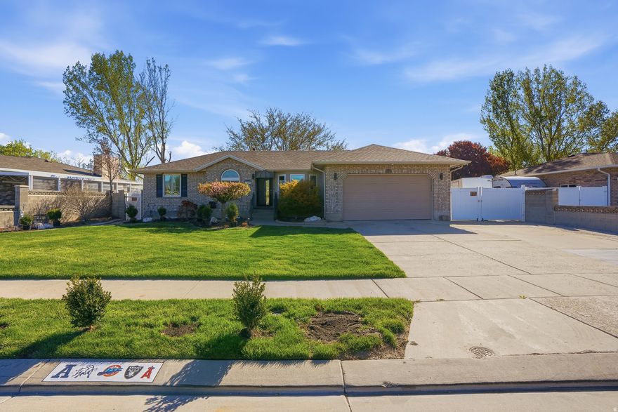 Accepting Backup Offers. Some homes just have it all figured out. 9489 Kirkside Drive is one of them. Nestled in South Jordan's sought-after Capital Estates neighborhood, this is the home where grandma and grandpa can be close - but not too close - where the holidays are always the prettiest on the block, and where your RV fits right in the driveway because, well, there's no HOA to say otherwise. The main level offers two bedrooms and comfortable living, while a fully appointed 3-bedroom accessory dwelling unit downstairs - with its own private entrance - Whether it's aging parents, adult children, or simply a mortgage-helper, this layout was made for the way modern families actually live. The brand new roof reshingled in 2025 means the big stuff is already done, and the professionally installed holiday lighting system means you'll be the house everyone slows down to admire come December. Beyond the front door, South Jordan delivers in every direction - top-rated Jordan School District schools just minutes away, the 160-acre Bingham Creek Regional Park for weekend adventures, The District for dining and shopping, and TRAX light rail access that puts downtown Salt Lake City just 20 minutes away. Toss in world-class skiing and Wasatch Mountain trails within an hour's reach, and you've got a home that doesn't just check boxes - it rewrites the list.  Square footage figures are provided as a courtesy estimate only and were obtained from County Records. Buyer is advised to obtain an independent measurement.