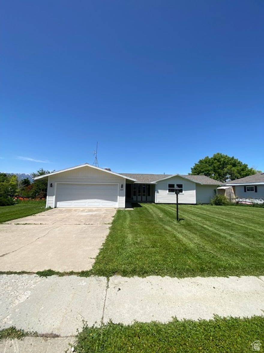 MOTIVATED SELLERS, PRICED TO SELL. Newly remodeled home in Providence Utah. 2,922 sq ft open floor plan with an unfinished basement. 3 bedroom, 2 bathroom. All new LVP and carpet flooring, new cabinets with quartz countertops throughout. Cultured marble shower and tub surrounds. Lots of charm with a gas fireplace, vaulted ceilings and beams in family room with large windows for lots of natural light. All new windows and doors. New vinyl siding/ paint on the exterior. Unfinished basement has a walkout basement ready to add basement property for investment. In a quiet, established neighborhood.