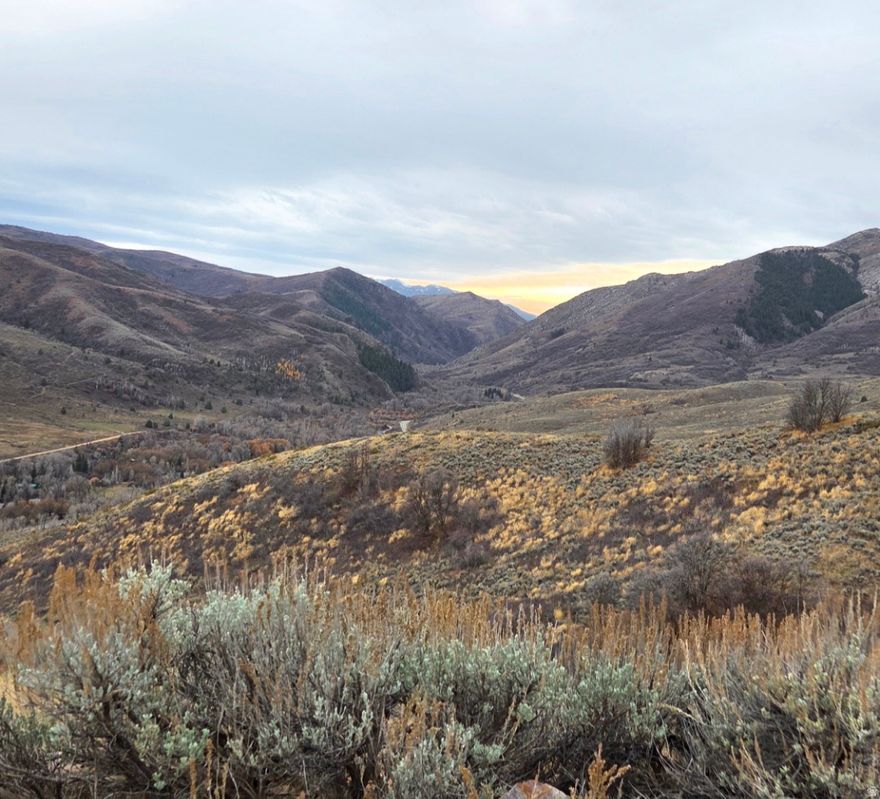 Escape to your private mountain sanctuary on a 2.5-acre parcel perched on the back side of the Wasatch Front in the Evergreen Area of Huntsville. This elevated lot delivers dramatic, unobstructed views across the valley to the surrounding peaks, making every sunset a postcard moment. Seasonal access ensures a peaceful, off-grid vibe- weekend basecamp, or a self-sufficient retreat you can enjoy year after year. Roads are not paved or maintained in this area.  Cell coverage is spotty. Build the retreat you've envisioned. If you're seeking more space, additional land is available. TAX ID: 23-024-0017 Offered at $74,000 for 4.5 acres.  Google map the lot location before you go. (2.5 miles up Evergreen Park Dr take left on High Pine then make your way down to the lot.)  Sign on property. Sloped lot, will need excavation. At this price a fantastic buy and hold!