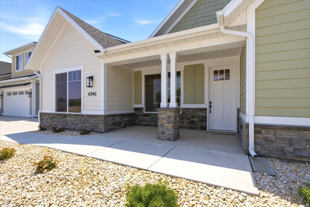 Photo of 6745 W JUDYS FARM LN #9, West Valley City, UT 84128 (MLS # 2167971)