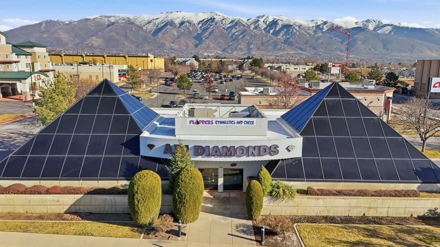 Rare opportunity to purchase a highly recognizable, pyramid-shaped commercial building with exceptional freeway visibility. This established diamond and jewelry business has successfully operated at this location for over 30 years, benefiting from strong brand recognition and consistent traffic exposure. Seller is open to selling the property and business together, or the property separately. Ideal for an owner-operator or investor seeking a landmark location with long-term presence.  Owner is willing to do creative financing or lease as well.  North side of building currently has a lease that is month to month.