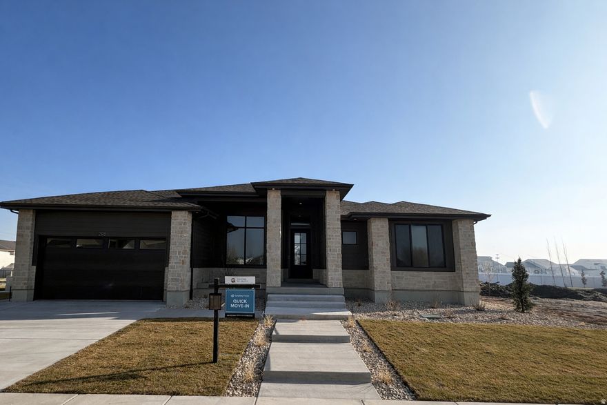 LOT#127. Come see the difference from Symphony Homes, a renowned local builder of semi custom homes! New luxury neighborhood of Amber Fields, perfectly located in Layton. Great looking rambler, the Tempo plan with our modern Prairie exterior. Many upgrades throughout and classy interior design and finishes! Decorative wall in flex room off of entry, LVP floors and stunning grid bean ceiling in the family room. Galley kitchen with oversized island bar, butler's pantry, and dining nook. Owner's suite has a recessed ceiling, garden tub, oversized shower with Euro glass and the walk-in closet is finished with custom built-ins. 2nd bedroom on main level has its own ensuite bathroom! Dedicated laundry room with a countertop. You'll love entertaining in the finished basement with family room/game room and attractive wet bar, along with cold storage and a finished storage closet. 14x14 covered patio, and lots of storage space throughout. 3rd stall of garage is 42' deep! Equipped with active radon system. Full yard landscaping is included in price and is currently in progress. Don't miss this one!