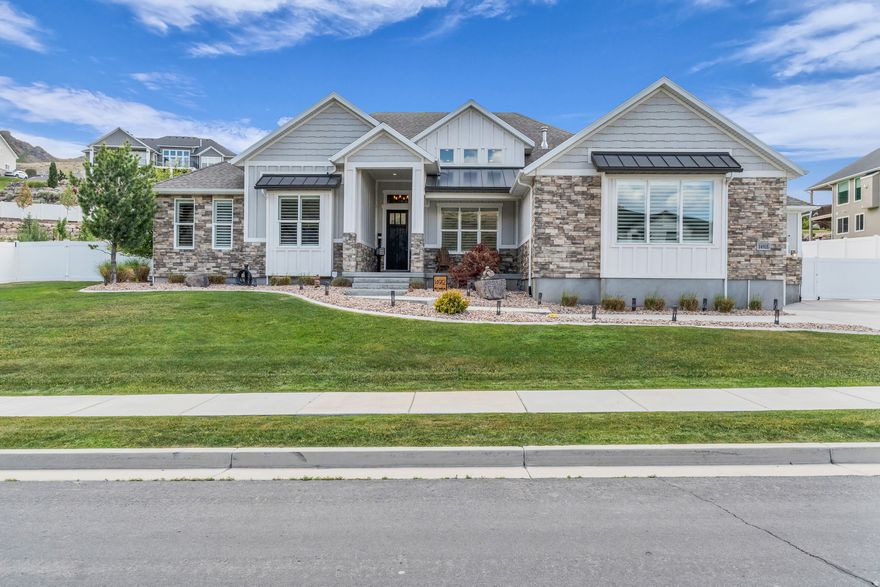 Welcome to this beautiful Herriman home located in the highly sought-after community of The Cove. This spacious home features an open-concept layout with vaulted ceilings and an inviting flow throughout. The stunning kitchen offers quartz countertops, ample space for entertaining, and opens seamlessly into the large family room, creating the perfect gathering space. Enjoy his and hers master closets, master closet hookup for washer & dryer. Step outside to a serene backyard retreat featuring a peaceful patio ideal for relaxing summer evenings with friends and family. The property also offers generous yard space, mature trees, and RV parking.  This home is more than just a place to live-it's part of a vibrant community. Residents enjoy access to the community pool and pond, along with biking trails, hiking trails, park, and playground designed for an active and connected lifestyle.  The unfinished walkout basement offers incredible potential with 9-foot foundation walls with ample space for four bedrooms and two bathrooms. It is also roughed in for a second HVAC system and plumbed for a future kitchenette, creating the perfect opportunity for a mother-in-law suite or potential rental income opportunity.  Schedule your private showing today!  *Square footage figures are provided as a courtesy estimate only and were obtained from building plans. Buyer is advised to obtain an independent measurement.