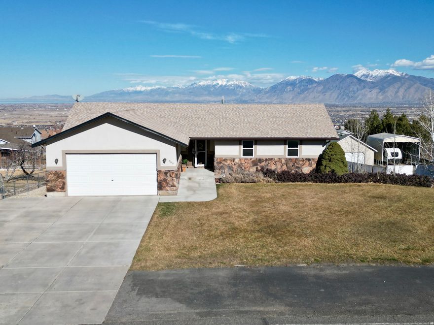 Beautiful home in a beautiful, highly sought after area of Utah County. This 5 bedroom, 3 bathroom home sits on a generous .43 acre parcel with gorgeous views. Additional 2 car garage/shop was built in 2015. New rain gutters, Furnace is only 2 years old. Priced to sell!  Make an appointment with your favorite Realtor today!