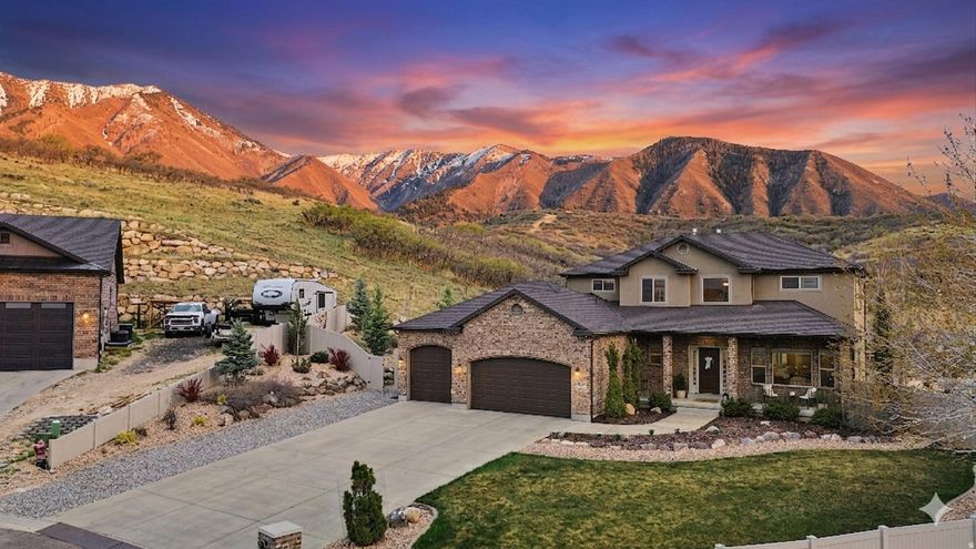 Beautiful custom home in Elk Ridge checks all the boxes! End of a cul-de-sac? Check. Almost an acre of property? Check. Scenic mountain views? Check. Panoramic valley vistas? Check. Timeless and thoughtful design? Check. Fully finished and turn-key? Check. Quality of life and serenity awaits in this gorgeous two story, four thousand square foot home with a fully fenced yard, six bedrooms, completed basement with entrance, well-equipped workspace or study on the main level with plenty of parking, a three car garage, garden boxes, play set and quality that can't be beat! SHOWINGS BEGIN WED April 8th. No sooner please. Enjoy the 3D tour until you can experience it in person!