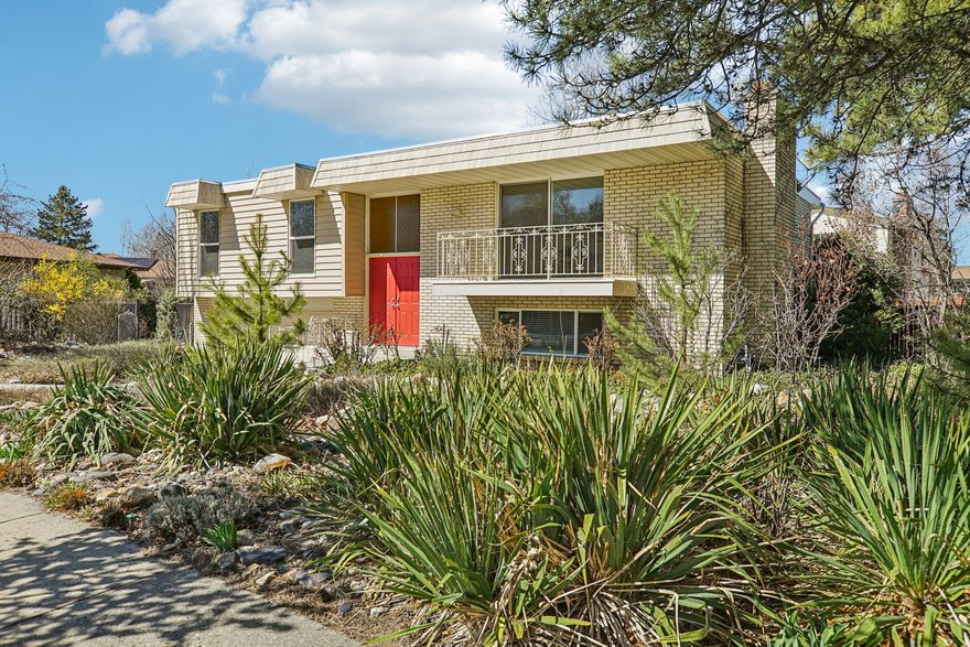 Beautifully updated home in the heart of Cottonwood Heights, offering breathtaking mountain views and modern upgrades throughout. This move-in-ready property features brand-new flooring and fresh paint, complemented by stylish new light fixtures that create a warm, contemporary feel.  The fully renovated kitchen showcases new cabinetry, sleek countertops, and a complete suite of stainless steel appliances.  A fully finished walk-out basement adds valuable living space.  Ideally located just minutes from hiking and biking trails, world-class skiing, as well as popular restaurants and shopping, this home perfectly blends comfort, style, and convenience.  The downstairs plumbing is in for an easy conversion to ADU/ Mother in Law apartment.