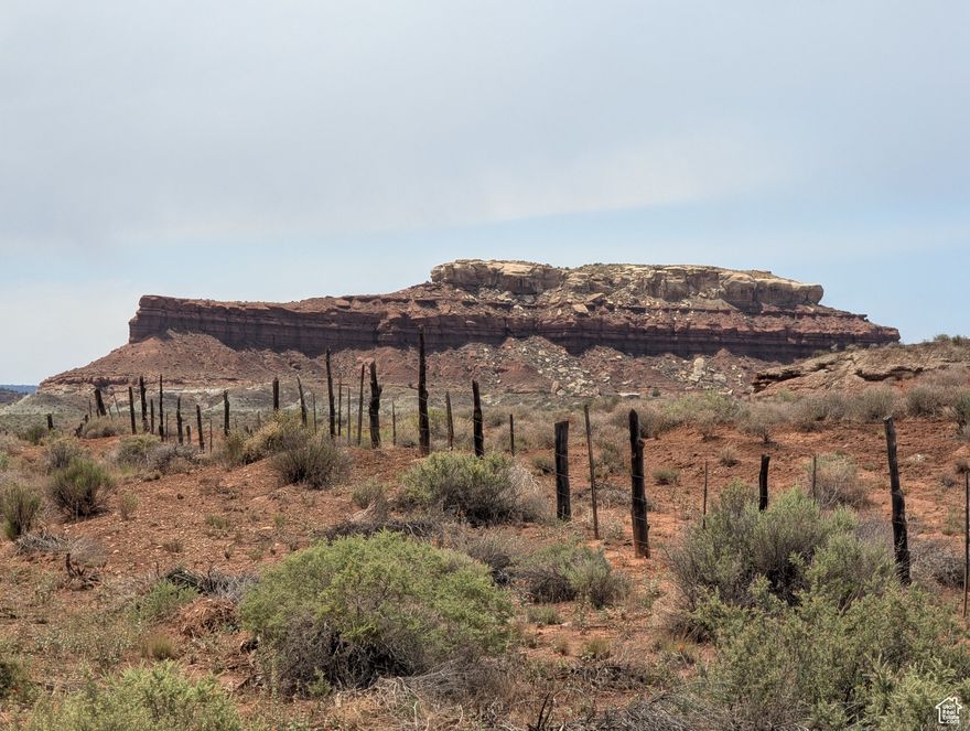 This 5-acre parcel of agricultural land offers a unique blend of privacy, convenience, and breathtaking scenery. Located just outside Fredonia and touching Highway 389, it ensures easy access while still providing that feeling of wide-open space. Imagine waking up to the panoramic views of Shiprock-an iconic landmark that stands like a silent sentinel on the horizon-right from your own backyard. Whether you're dreaming of a horse property, a quiet country retreat, or a place to build your custom home, this parcel checks all the boxes. With agricultural zoning, you have the flexibility to create your ideal lifestyle. The land's proximity to town means you're never far from amenities: Around 10 minutes to Kanab, the gateway to Zion, Bryce, and the Grand Canyon A short drive to the Kaibab National Forest for endless outdoor adventures This property combines the best of both worlds: convenient access and peaceful seclusion. Don't miss this opportunity to own a slice of the Arizona high desert, where the sunsets are as vast as the possibilities. Requires a well for water. Buyer to verify all