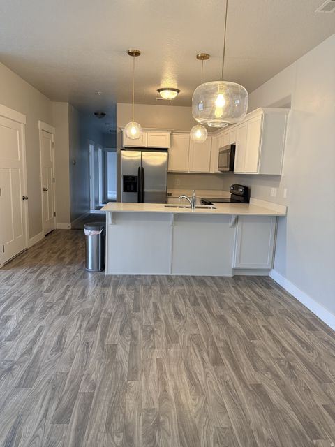 Photo of 14469 S SELVIG WAY W #C204, Herriman, UT 84096 (MLS # 2133097)