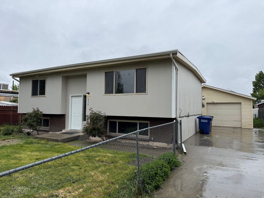 Huge upgrades ready to move in.   New flooring, paint, countertops.  Contemporary new bathroom, new appliances, and many more.  Newer driveway and roof.  Fully fenced yard for your pet.  Large garage for cars and storage.  Safe clean neighborhood.