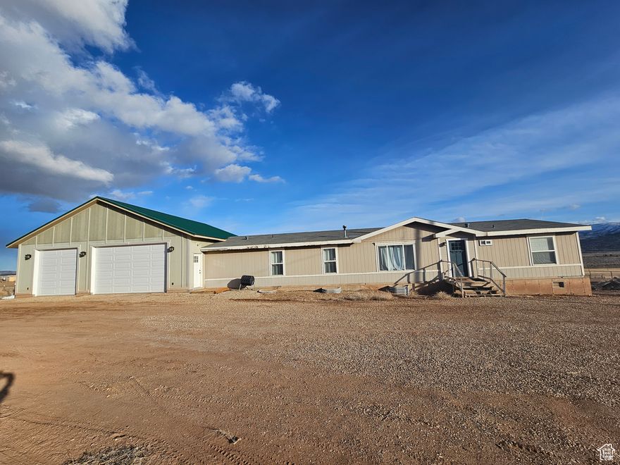 HUGE price reduction with possible seller financing! Amazing views and privacy from this 10-acre homestead like setting within 45 minutes of Heber. High speed internet for remote working or simply retire and enjoy the views. With barn and corals, there is enough room for all your horses, cows or sheep along with 6 irrigation shares so you can grow a nice pasture. If you want rural living yet close enough to city life, this is definitely worth a look! Sq Feet from tag under sink and tape measure. Buyer to verify all. Sq footage does not match the county records for some reason not known to seller.