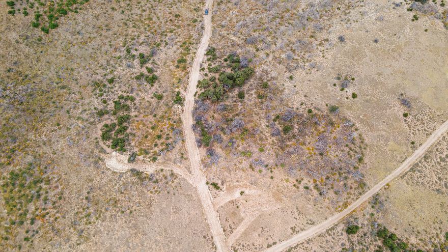 10-acre parcel rich with natural beauty, stunning views, and offering flat and usable terrain that's perfect for outdoor recreation, relaxation, or your future retreat. Property features spacious RV pad that can comfortably accommodate 4+ RVs, ideal for hosting friends, family, or an exploration/hunting base camp. A completed survey has been done, and property corners are clearly marked for easy identification, giving buyers added peace of mind and clarity. **Seller is willing to grade or excavate the property upon request can set up for off grid living, for an additional cost. Utilities may be brought up at buyers expense.** Adjacent to Lot #94 (parcel 00-0017-2514) available for purchase. Expand your footprint and acquire a total of 20 acres with these two lots. Whether you're looking for a recreational getaway, a private camping spot, or a future cabin site, this land is a blank canvas for your vision. Buyer and buyer's agent to verify all information.