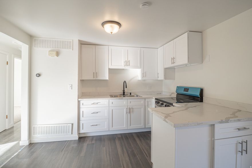 This beautifully updated 3-bed, 1-bath single-level home, located just behind Lincoln Elementary in Layton, offers exceptional value as the best-priced home in all of Davis County. Completely redone inside, it features a brand-new kitchen, new flooring throughout, a new toilet and vanity, and has been thoroughly deep cleaned, including professional window cleaning for a truly move-in-ready feel. A new stove adds to the fresh, modern upgrades, and the included hot tub provides an extra touch of comfort and relaxation. This is an unbeatable opportunity to own a turnkey home in a convenient, established neighborhood.