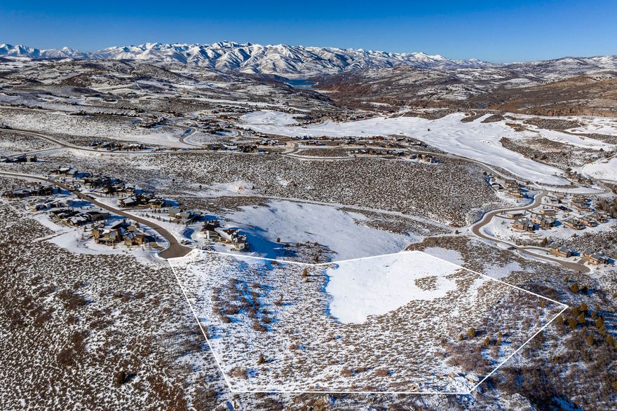 Discover the epitome of mountain living on this 10-acre, stand-out parcel of land in Victory Ranch. Boasting panoramic views of Deer Valley, the Uinta Mountains, the golf course, and the Provo River. This prime location offers a rare opportunity to build your dream home in a setting that seamlessly blends nature's beauty with luxurious living. This dynamic lot offers 10 acres, 2 build pads, up to 9,000 sq. ft. for the main house and 2,500 sq. ft. for the guest home. Victory Ranch is a private, four-season community of 6,500 pristine acres along four miles of the Upper Provo River. Amenities include an 18-hole Rees Jones golf course, brand new golf clubhouse, world-class fly-fishing, miles of mountain biking and hiking trails, 5-stand shooting facility, 4x4 adventures, snowmobiles, ice skating rink, backcountry yurts, fishing ponds, multiple restaurants, ski access lodge in Park City and more than 3,500 acres of untouched backcountry. The Post Clubhouse includes our concierge team, heated pool, hot tubs, fire pit and seasonal grill. The Barn features a Pizza and Ice Cream Parlor, Art Studio, Game Room and Indoor Basketball and Sport Court as well as a Fitness Center, and Spa. The swimming pool, waterslide, pickle, tennis, paddle courts, and event lawn will be sure to provide hours of family fun. The new Golf Clubhouse restaurant, event space, simulator, and pro-shop are now open. Victory Ranch is approximately 15-minutes from Deer Valley and 25 minutes to Park City. For winter enthusiasts, this property is a mere 15 minutes away from the nearest Gondola, giving easy access to the renowned Deer Valley Resort. Be among the first to experience the charm of East Village, Deer Valley's newest addition, offering world-class amenities, dining, and entertainment. Embrace the convenience of living just moments away from the slopes while reveling in the serenity of your private mountain escape.