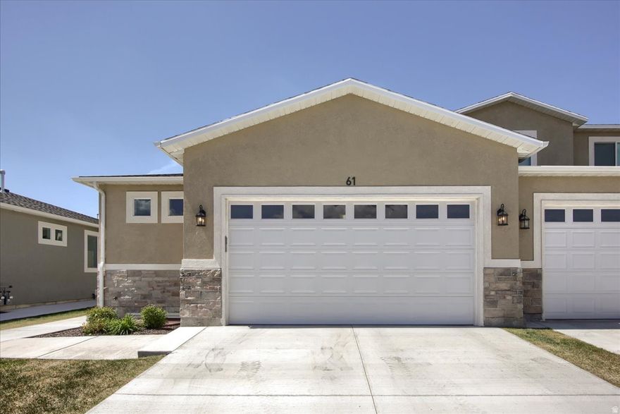 Welcome to easy living in this beautifully designed rambler-style townhome in Tremonton. Featuring true main-level living, this home offers a spacious and functional layout with everything you need conveniently located on the main floor-perfect for those seeking comfort, accessibility, and simplicity. The open-concept living area creates a bright and inviting space, ideal for both everyday living and entertaining. The kitchen flows seamlessly into the dining and living areas, making it easy to stay connected with family and guests. Downstairs, a fully finished basement provides additional living space, perfect for a second family room, guest area, or home office-giving you flexibility to fit your lifestyle. Whether you're looking to downsize without sacrificing space or searching for a low-maintenance home with room to grow, this property offers the best of both worlds. Conveniently located near local amenities, shopping, and easy access to main roads, this is an opportunity you won't want to miss.  Square footage figures are provided as a courtesy estimate only and were obtained from county .  Buyer is advised to obtain an independent measurement.