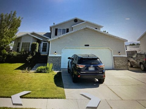 Photo of 5231 W RIDGE FLOWER WAY, Salt Lake City, UT 84118 (MLS # 2148773)