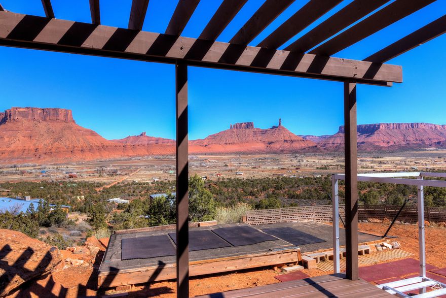 Nestled in the heart of the serene desert, this remote, off-grid haven offers unparalleled tranquility and breathtaking vistas that stretch as far as the eye can see. Imagine waking up to sunrises painting the horizon in vibrant hues and drifting off under a blanket of stars. 0.45 acre feet of domestic water rights from a natural spring are included. This property is connected to septic and has a newly installed, graded driveway. There is a small, simple structure already built for your convenience while you build your dream home, or to use as storage. The seller is willing to include the 1992 SNLT Discover Trailer and 2002 Jeep Wrangler with any reasonable offer so your new adventure in Castle Valley can start now. This unique escape is perfect for those seeking solitude, adventure, and a sustainable lifestyle amidst nature's grandeur. Whether you dream of a personal retreat, an artist's sanctuary, or an eco-friendly abode, this property promises endless possibilities. Embrace the beauty of untouched wilderness and make this desert oasis your very own. The property is taxed as a secondary residence. Property taxes would be about half for primary residents.