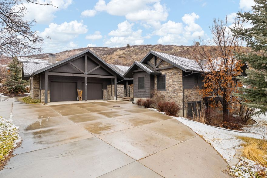 This stunning custom modern mountain home blends seamlessly into the breathtaking natural surroundings of the exclusive **Cottages at Hobble Creek** development, offering unmatched privacy and tranquility in scenic Hobble Creek Canyon, Springville. Exceptional craftsmanship shines throughout, with wood frame windows, radiant floor heating on both levels, and year-round comfort. The gourmet kitchen features a Viking gas cooktop, pebble ice maker, and double ovens. Separate formal dining and living rooms provide perfect spaces for entertaining. The private master suite opens to a deck with a dual-sided gas fireplace, ideal for cozy relaxation and panoramic views. Starlink internet keeps you connected. The walkout basement is guest-ready with a wood-burning fireplace, separate shower/toilet in each bathroom, dedicated laundry room, and an additional main-level guest bedroom. Ample storage enhances everyday functionality. Enjoy the soothing sounds of the stream at the property's edge. Conveniently located near the renowned **Hobble Creek Golf Course**, National Forests, parks, and a family recreation pond, this exceptional home offers serene mountain living at its finest. **Furnishings may be negotiated for a full turnkey opportunity.** https://jc-real-estate-media.aryeo.com/sites/121-oakwood-dr-springville-ut-84663-22134189/branded Square footage figures are provided as a courtesy estimate only and were obtained from public records.  Buyer is advised to obtain an independent measurement.