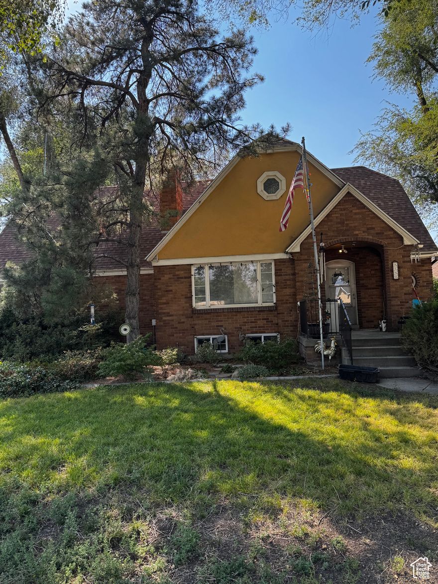 Discover a piece of West Jordan history at 8180 S Old Bingham Highway - once a charming dairy farm, now a beautifully preserved cottage sitting on 1.46 gated acres. This unique property blends old-world character with modern functionality, featuring six bedrooms, three bathrooms, and a walkout basement with a full mother-in-law suite. With three commercial outbuildings, agricultural zoning, and ample parking including RV space, this estate offers endless opportunities for living, working, or investing. A rare find with timeless charm and open potential. This is zoned for argicultural, if you're looking for a property to house animals, this would be the perfect property. Shingles have a 50 year life span, 35 years remaining. Sold as is.