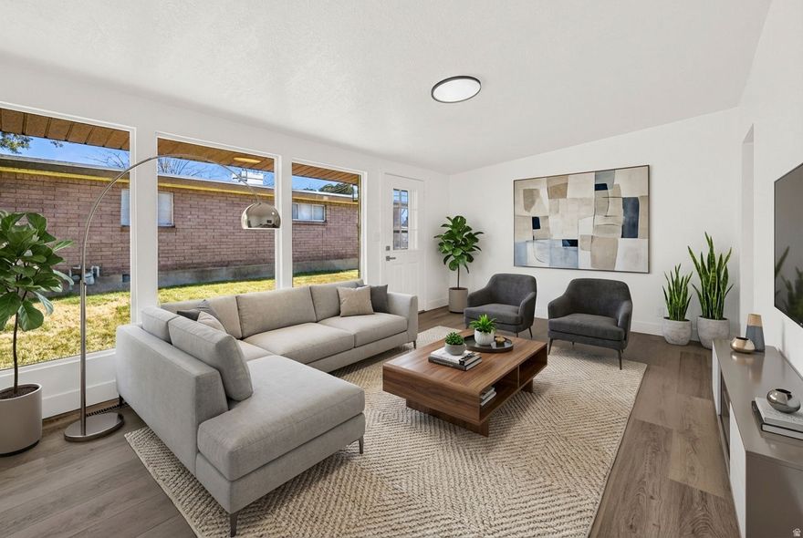 Welcome home to this fully remodeled and beautifully updated property located in a quiet, well-kept neighborhood. This home features a fantastic layout with 5 spacious bedrooms and 2 full bathrooms, offering plenty of room for family, guests, or a home office setup. The garage is listed as a single car but is similar width of a two car, great carport in the front as well. The large family rooms provide great gathering space, while the abundance of windows brings in tons of natural light throughout the home. The kitchen has been completely refreshed with brand new cabinetry, stunning quartz countertops, and all new appliances, including a full-size side-by-side refrigerator, making it both stylish and functional. A separate laundry room adds extra convenience and space. You'll notice the quality updates the moment you walk in, including new blinds, updated windows (within the last 5 years), new doors, molding, and trim, along with waterproof laminate flooring and updated tile throughout. The roof is approximately 4 years old, rain gutters are also brand new. A majority of the plumbing has been updated, along with some new electrical, including new lighting, outlets, switches, and updated plumbing fixtures giving added peace of mind for future ownership. Outside, the property continues to impress with a great-sized shed with power, plus a spacious, clean, finished garage that's perfect for parking, storage, or a workspace. This home is exceptionally clean inside and out and truly move-in ready. Perfect for buyers looking for a turnkey property with modern updates, great space, and a welcoming feel.