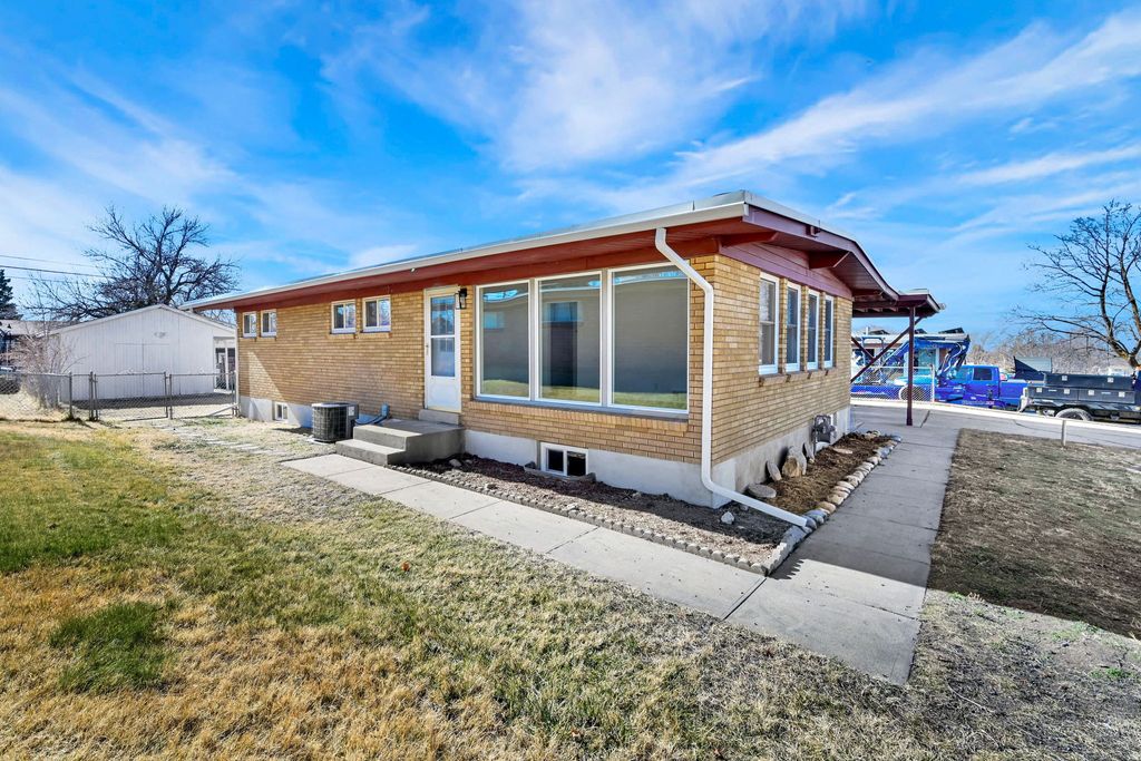 Photo of 2105 W 5700 S, Roy, UT 84067 (MLS # 2136049)